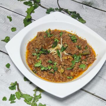 keema karahi served in white plate