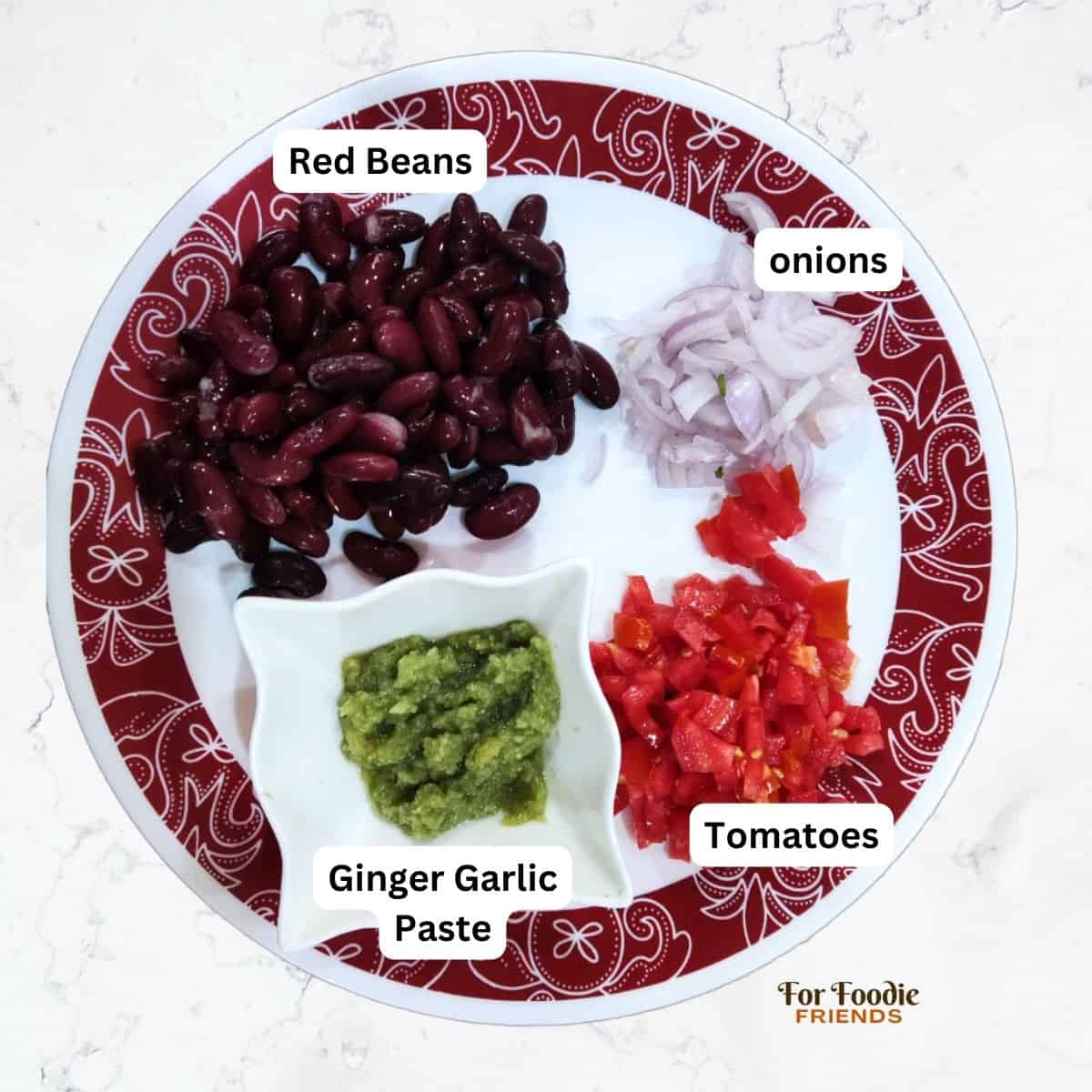 Rajma masala ingredients served in plate with name of each ingredient to make rajma masala