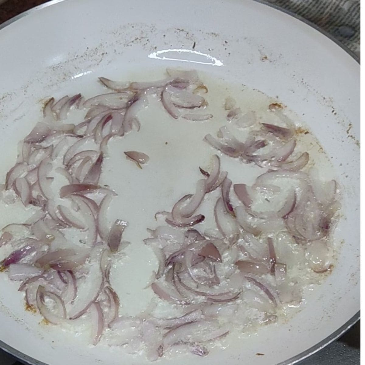 sauting the onions for rajma masala