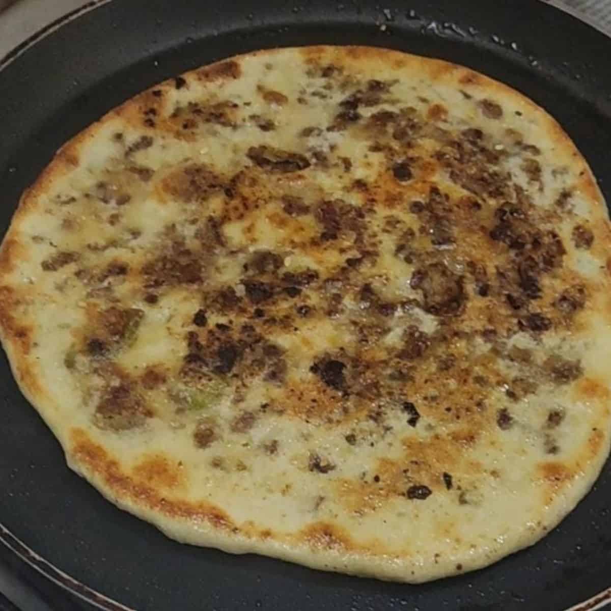 steps to ready and cook keema naan or stuffed naan at home