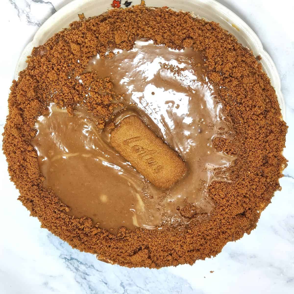 Your delicious Lotus Cheesecake is ready! Serve chilled.