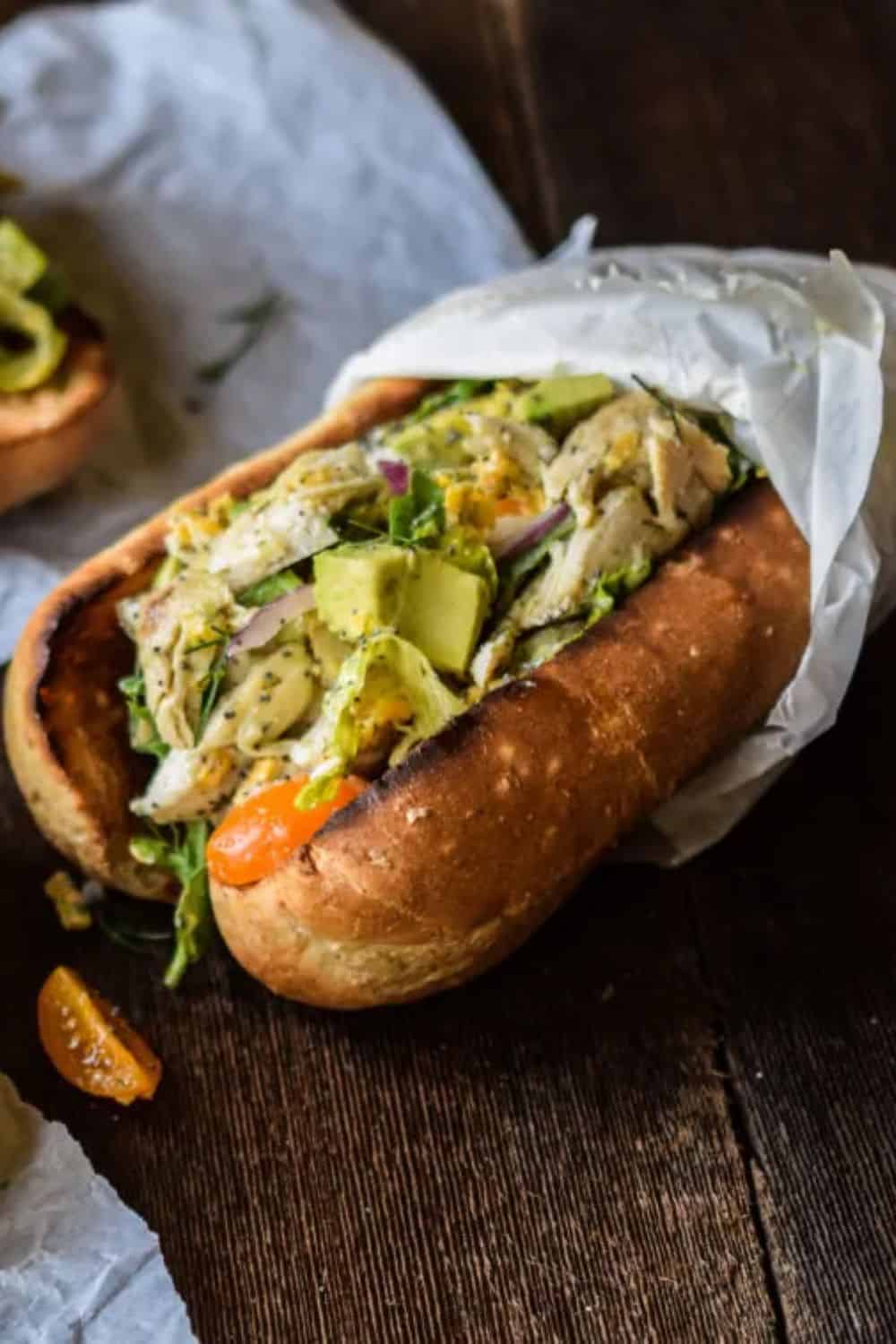 classic chicken salad sandwich creamy filling fresh bread crispy lettuce tomato deli-style portable lunch picnic