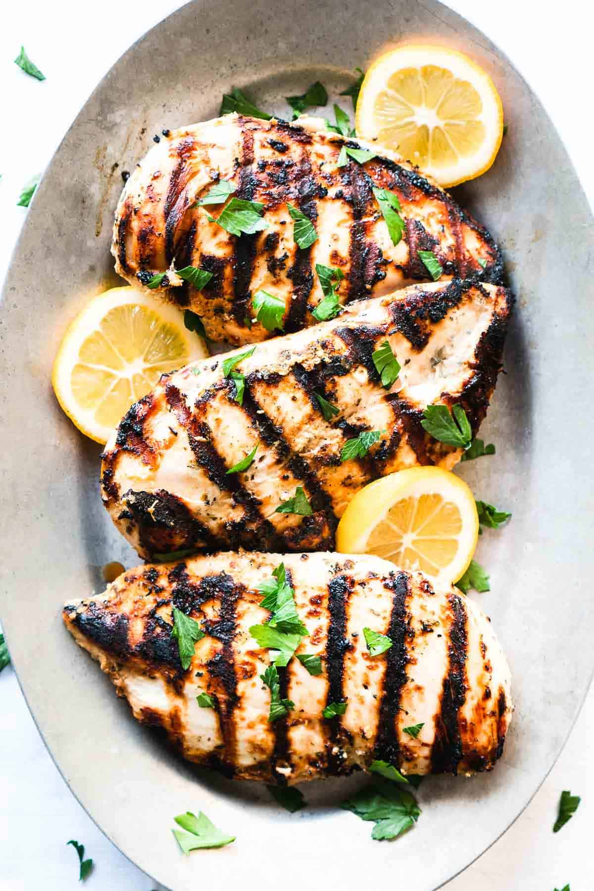 Greek yogurt marinated chicken Mediterranean tender juicy lemon garlic herbs healthy meal-prep gyros pita salads