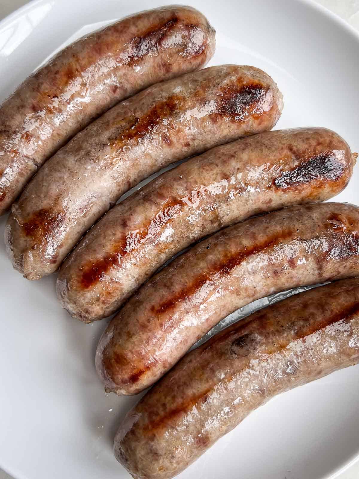 grilled beer brats Wisconsin classic bratwurst onions sauerkraut mustard buns game day tailgate cookout