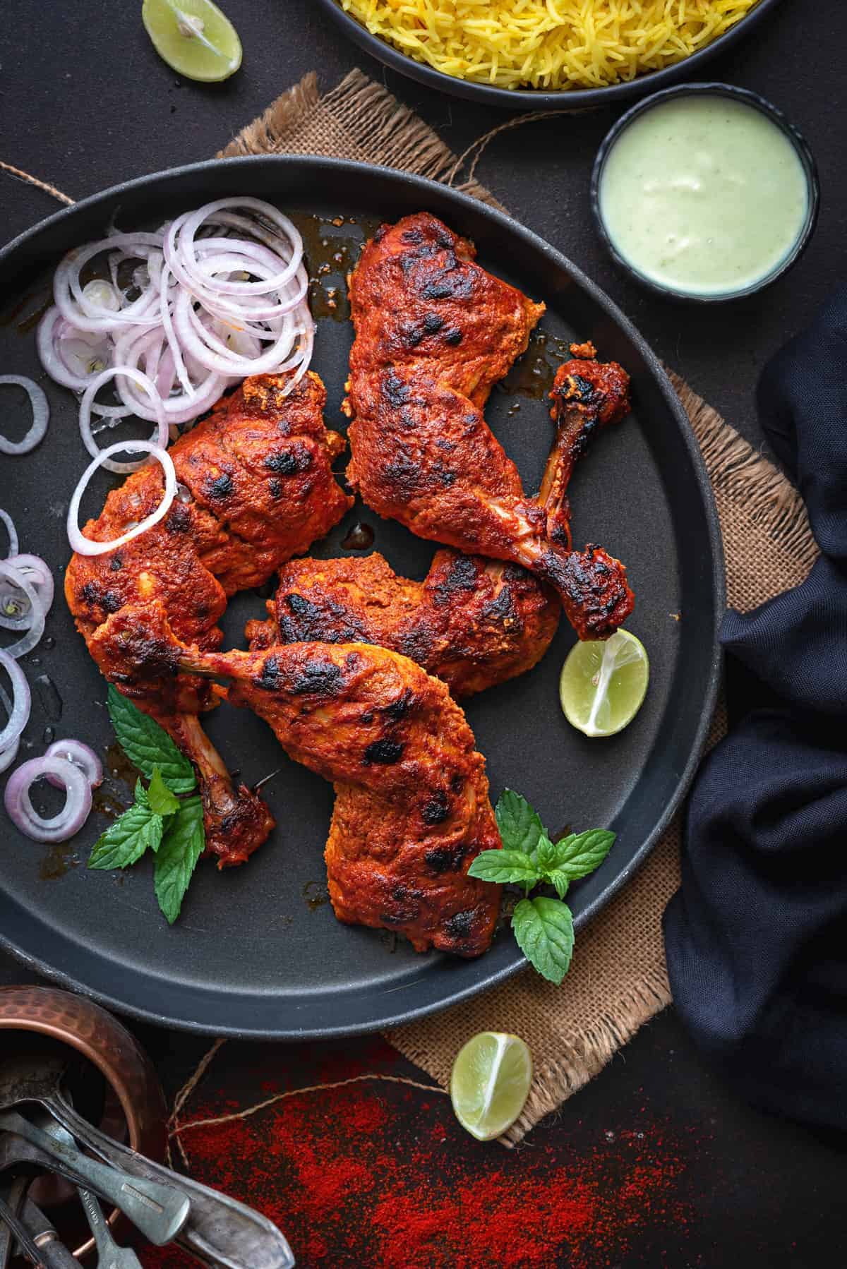 best tandoori chicken Indian yogurt marinade garam masala turmeric paprika charred saffron rice naan mint chutney