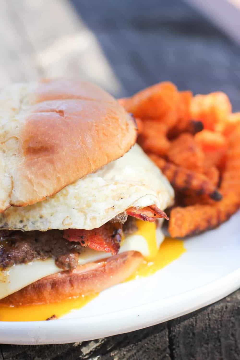 hangover burger fried egg crispy bacon American cheese sriracha mayo brunch indulgent over-the-top loaded comfort