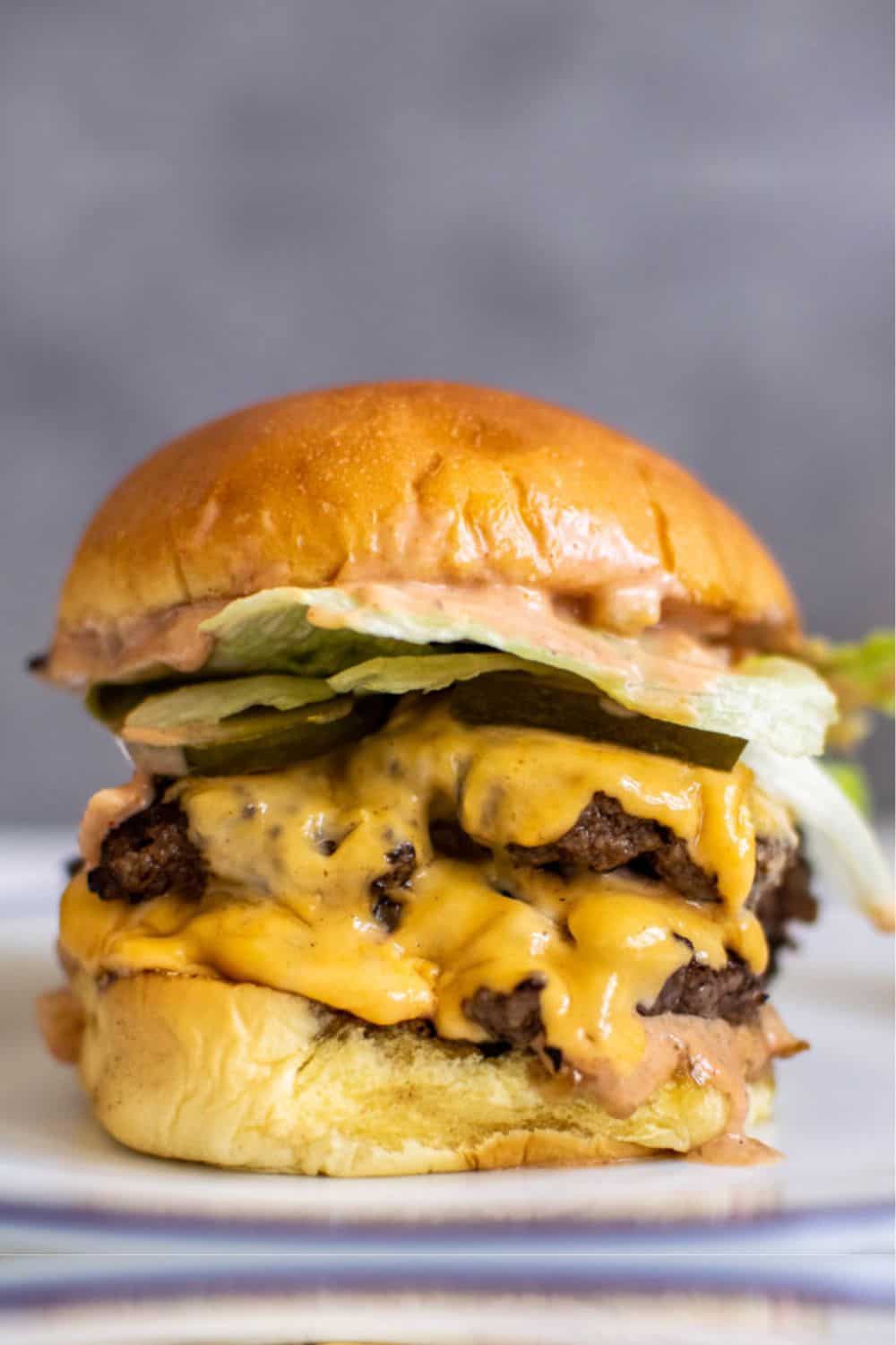 double smash burgers special sauce two stacked patties American cheese juicy crispy edges restaurant-style indulgent