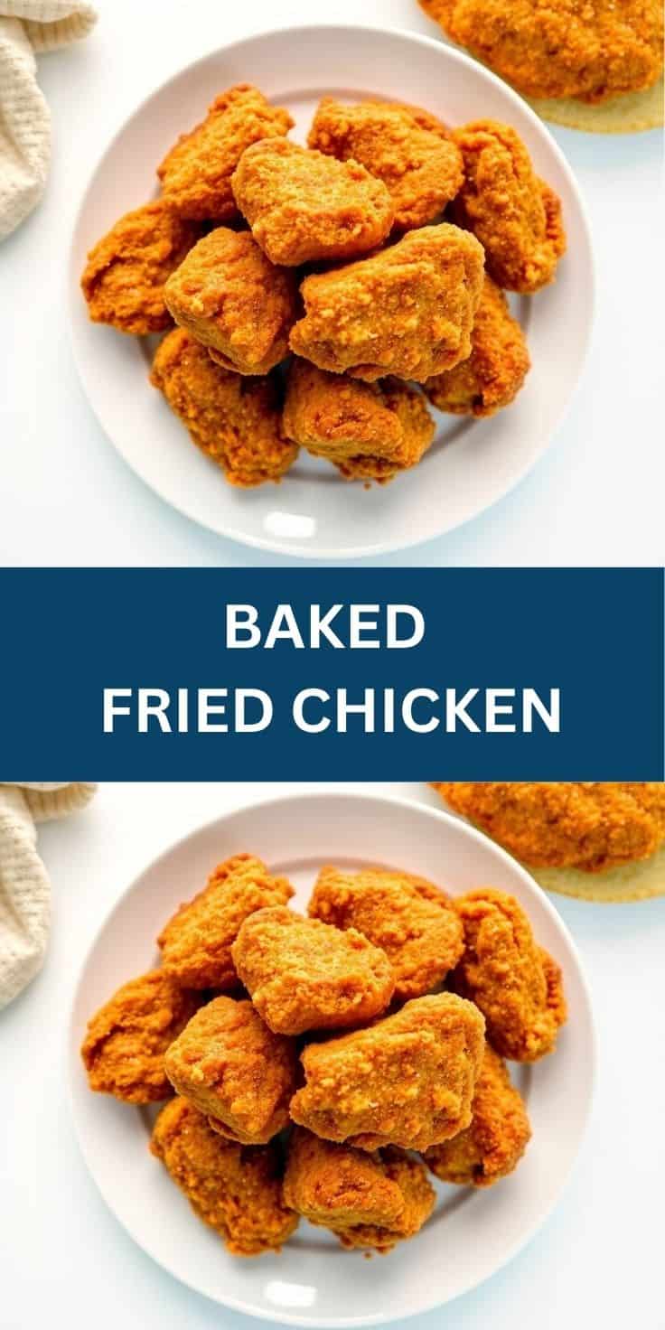 Golden-brown baked fried chicken pieces arranged on white plates against a light blue surface.