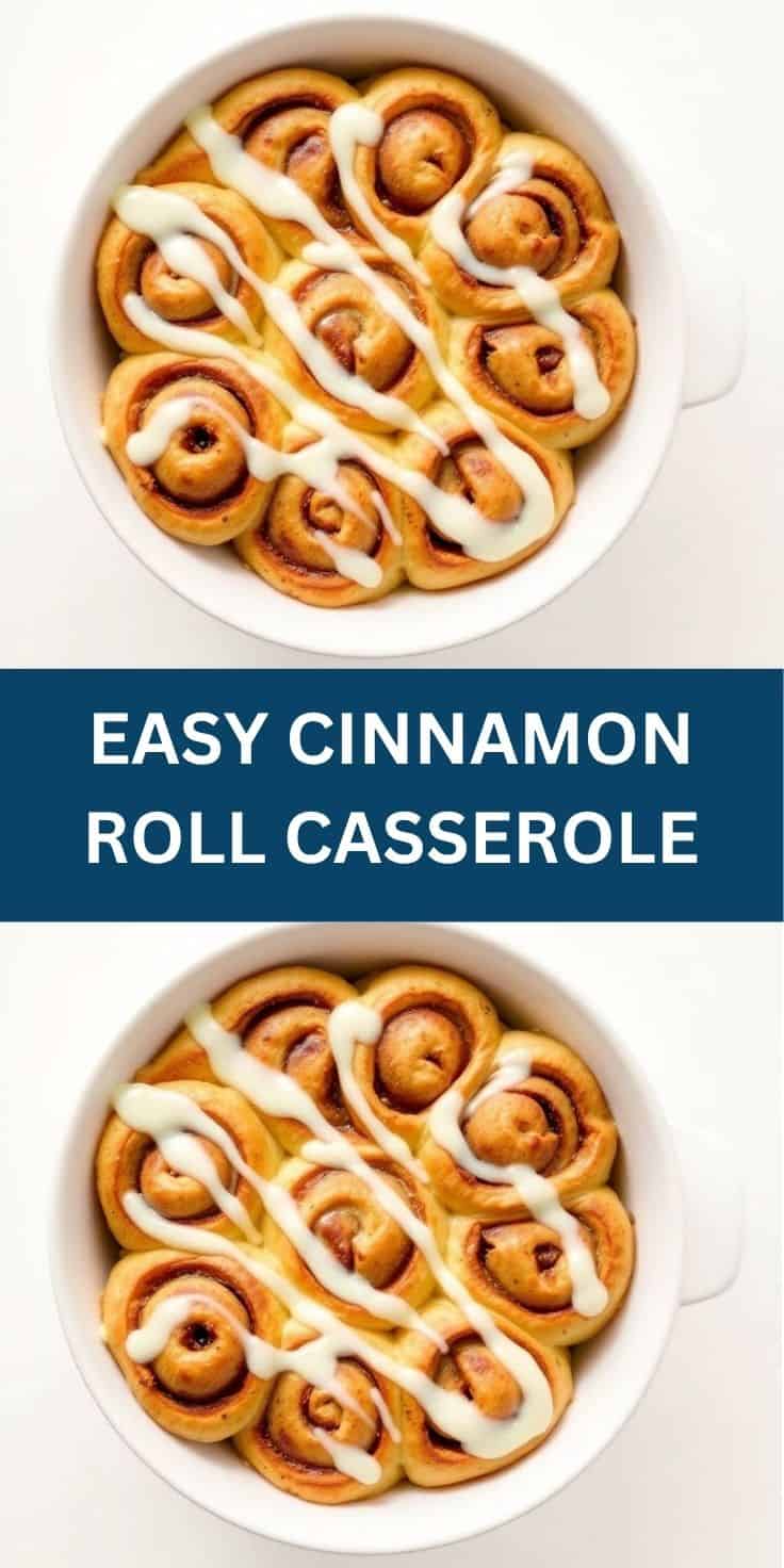 Baked cinnamon roll casserole in white dish with white cream cheese frosting drizzle.