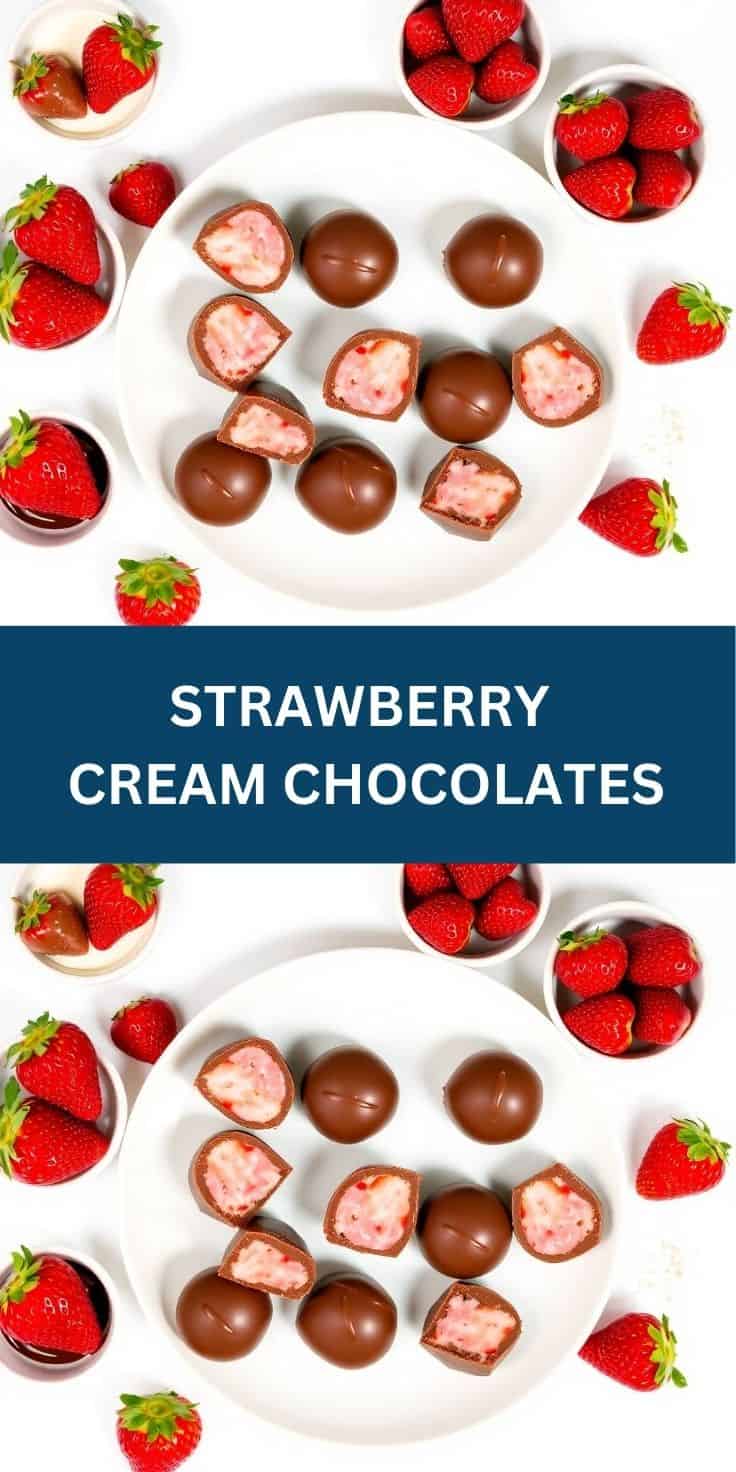 Strawberry cream chocolates on white plate with fresh strawberries arranged around them.