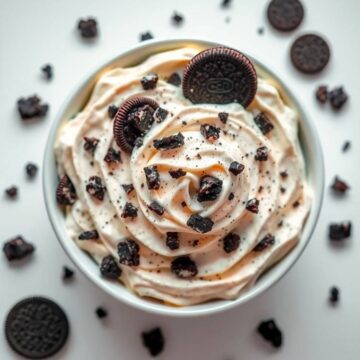 Delicious Oreo cream salad with whipped topping and cookie crumbles.