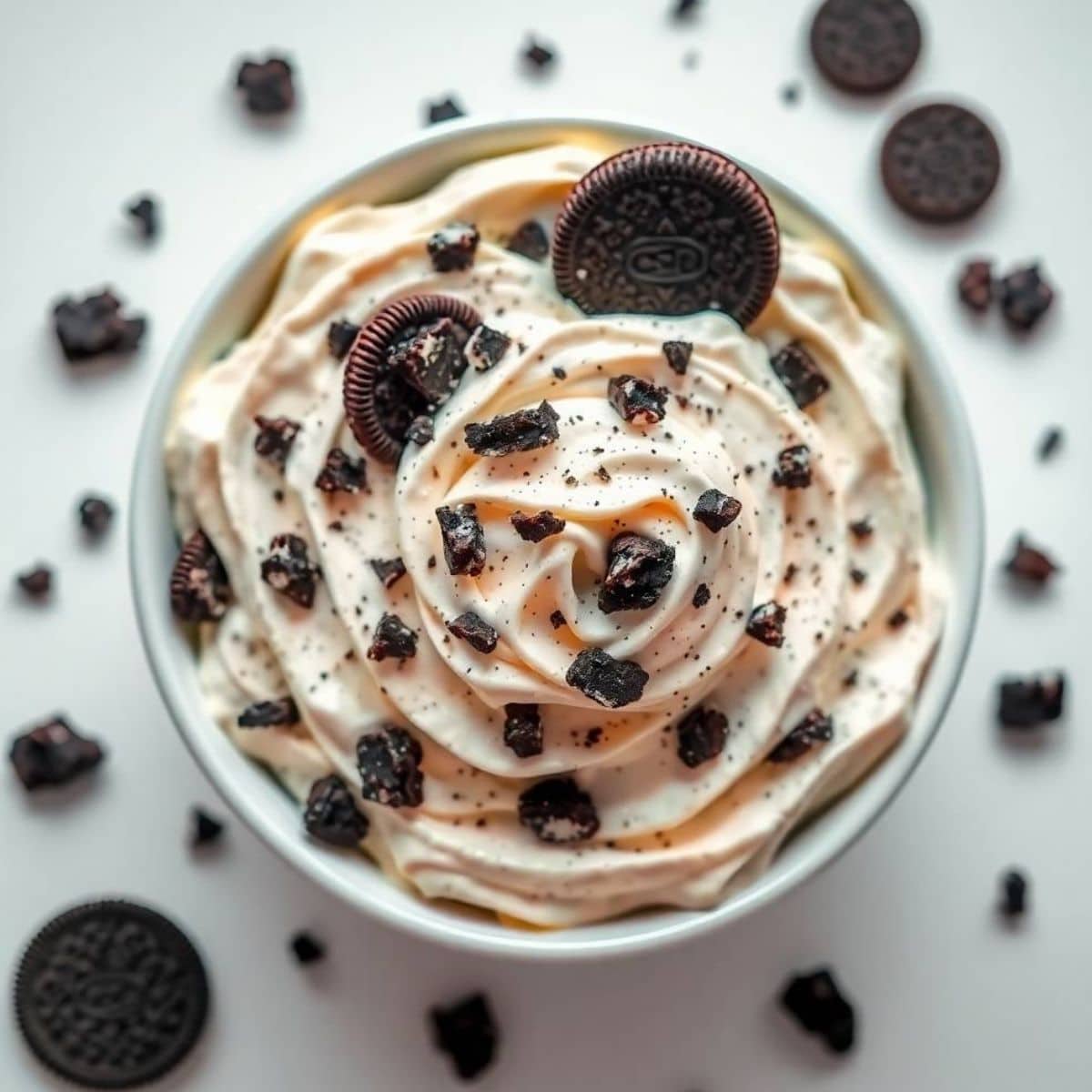Delicious Oreo cream salad with whipped topping and cookie crumbles.