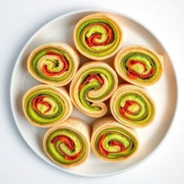 Delicious avocado and bacon pinwheels, perfect appetizer or snack.