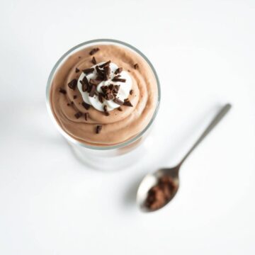 Delicious classic creamy chocolate mousse topped with whipped cream and chocolate shavings. Perfect.
