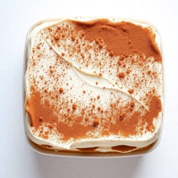 Tiramisu dessert with cocoa powder and creamy layers, perfect for a classic Italian treat.