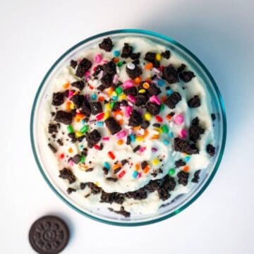 Delicious no-bake icebox cake with Oreo cookies, colorful sprinkles, and creamy whipped topping. Per.