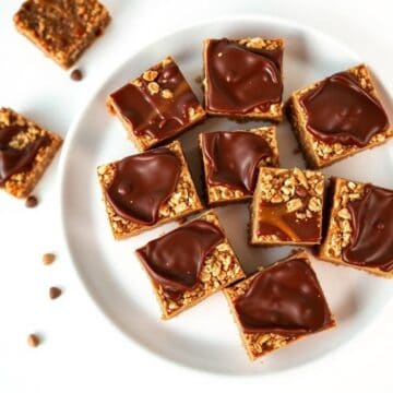 Delicious chocolate oatmeal caramelitas topped with chocolate glaze and crunchy oats.