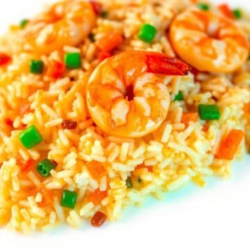 Delicious shrimp fried rice with tender shrimp, colorful vegetables, and fluffy rice, perfect for a.